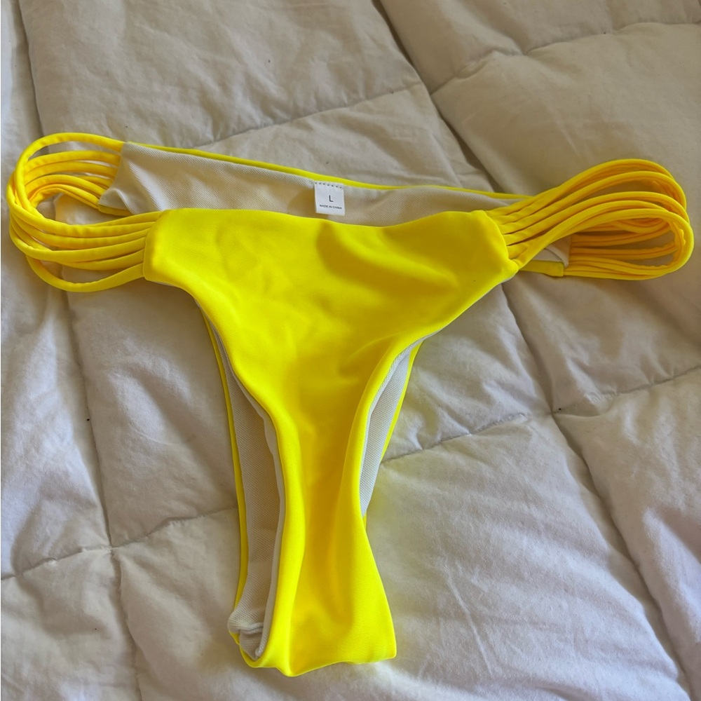 Yellow bikini bottom. Boutique size large
